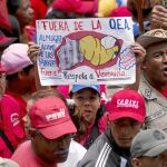 Simpatizantes chavistas se manifiestan, ayer en Caracas, contra la Organización de Estados Americanos (OEA)