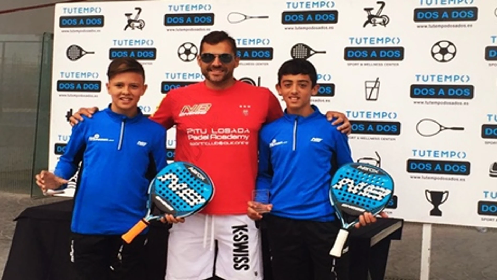 Pitu Losada con sus jugadores