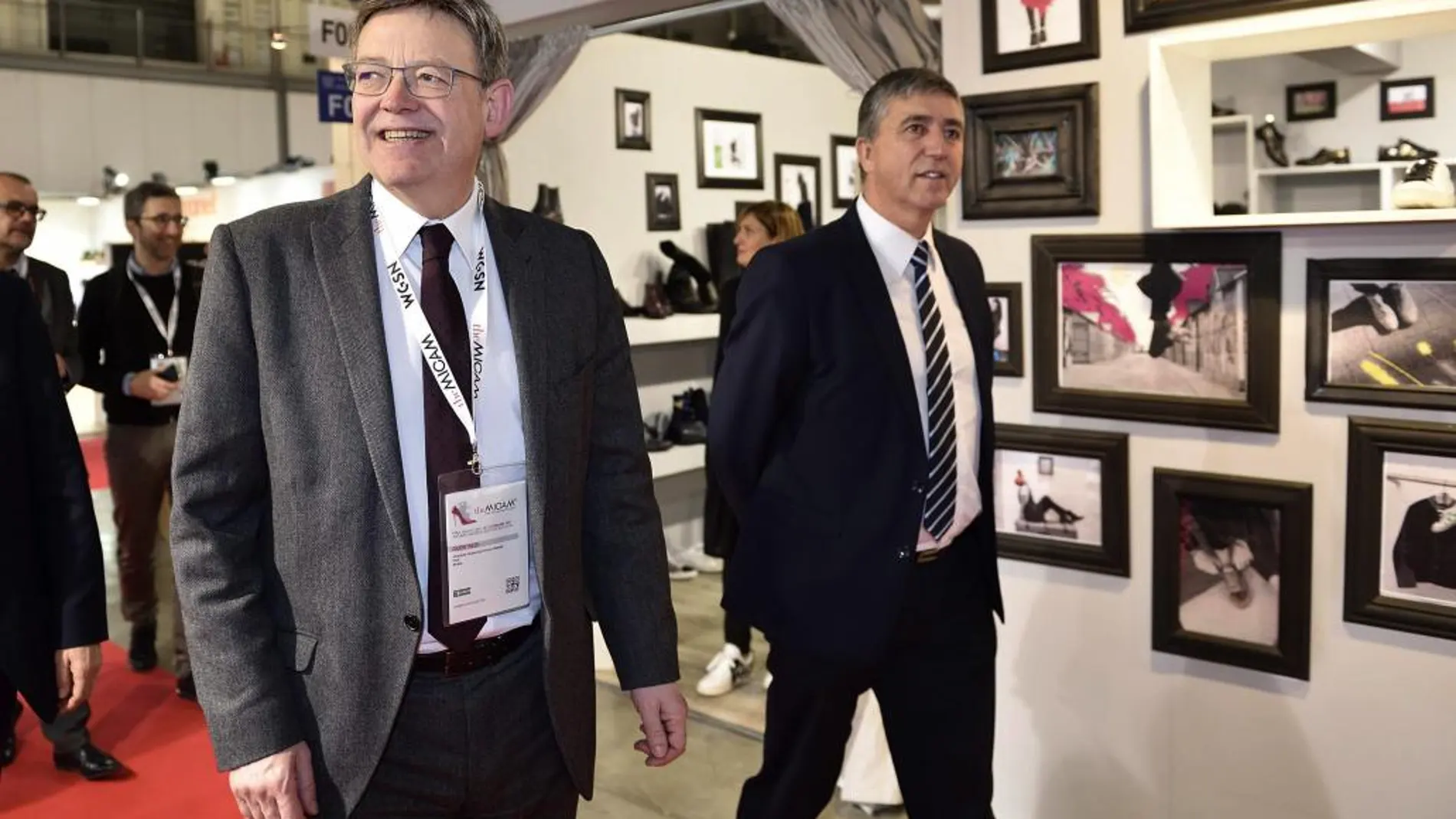 El presidente de la Generalitat, Ximo Puig, junto al conseller Climent, en la feria de Milán