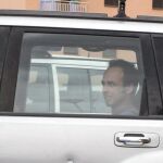 Arcuri, en un coche policial
