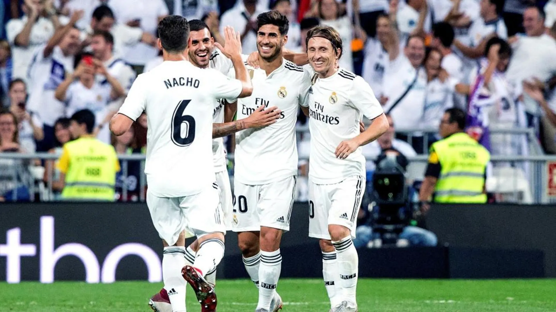 Los jugadores del Real Madrid celebran el gol anotado por Marco Asensio ante el Espanyol / Efe