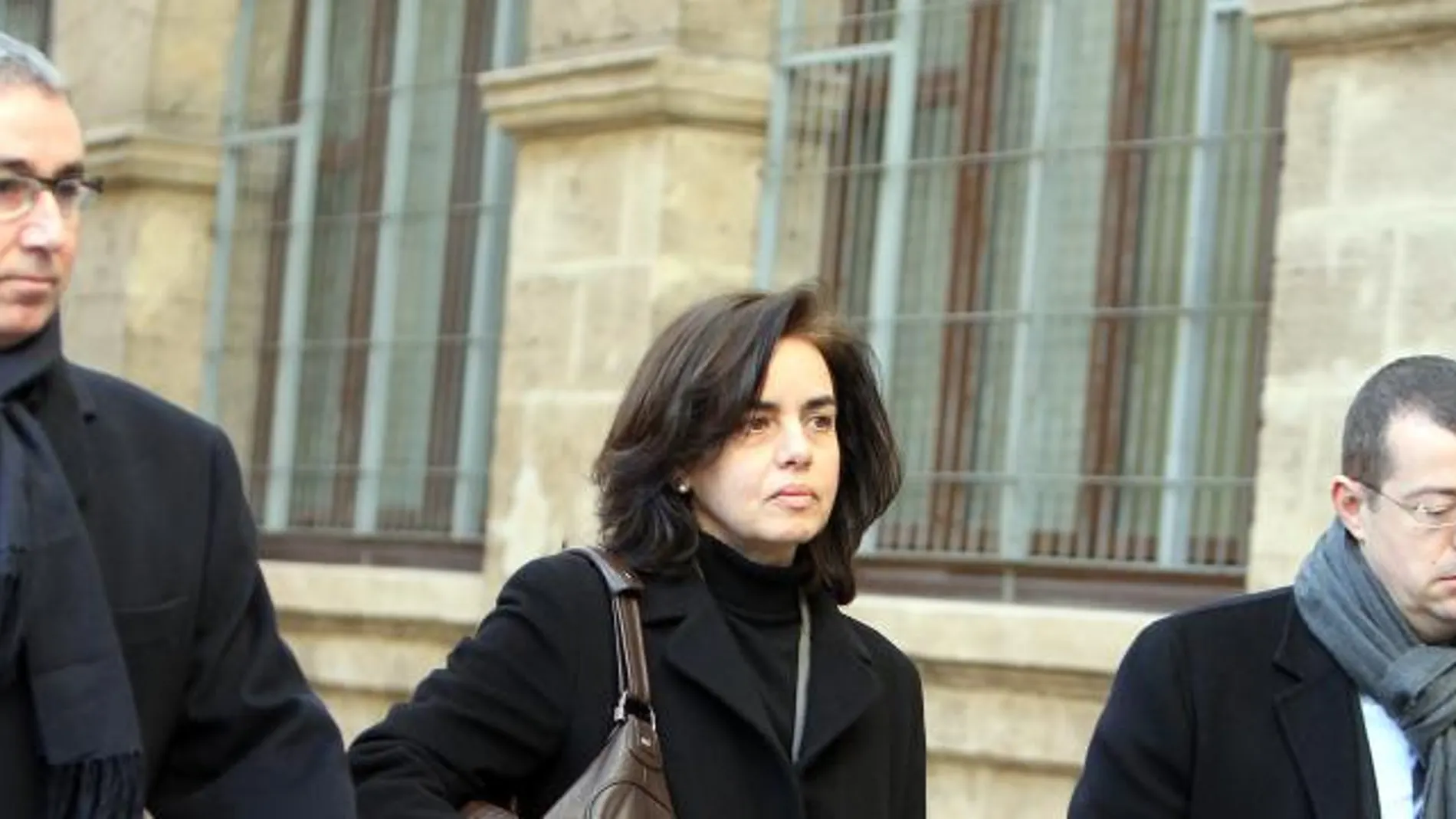 El exsocio de Iñaki Urdangarin, Diego Torres, acompañado de su mujer, Ana María Tejeiro, y su abogado a su llegada hoy a los juzgados de la capital balear