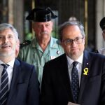 El presidente de la Generalitat,Quim Torra, junto al ministro de Interior, Fernando Grande-Marlaska. Foto. Efe