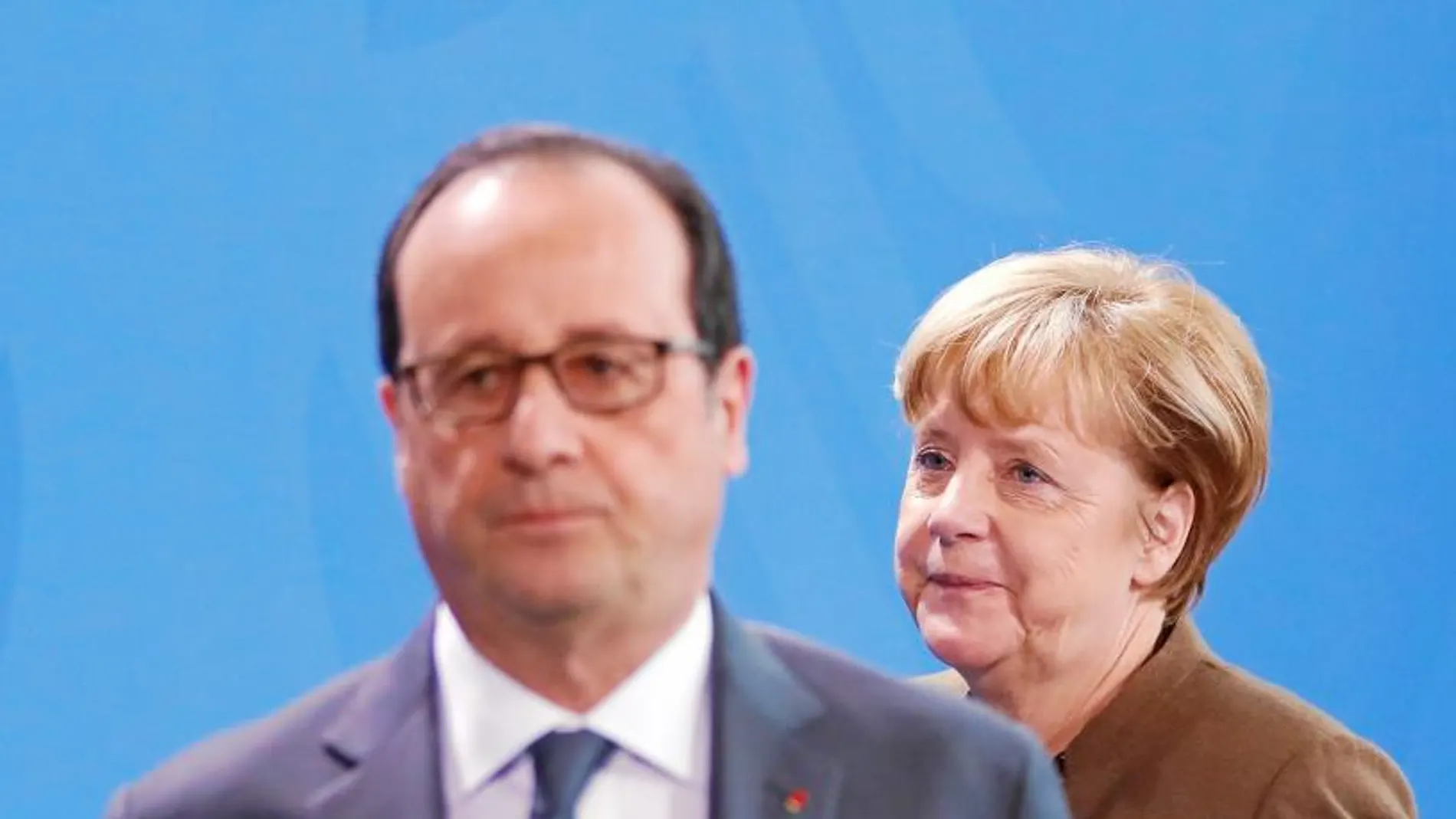 François Hollande y Angela Merkel, ayer en Berlín