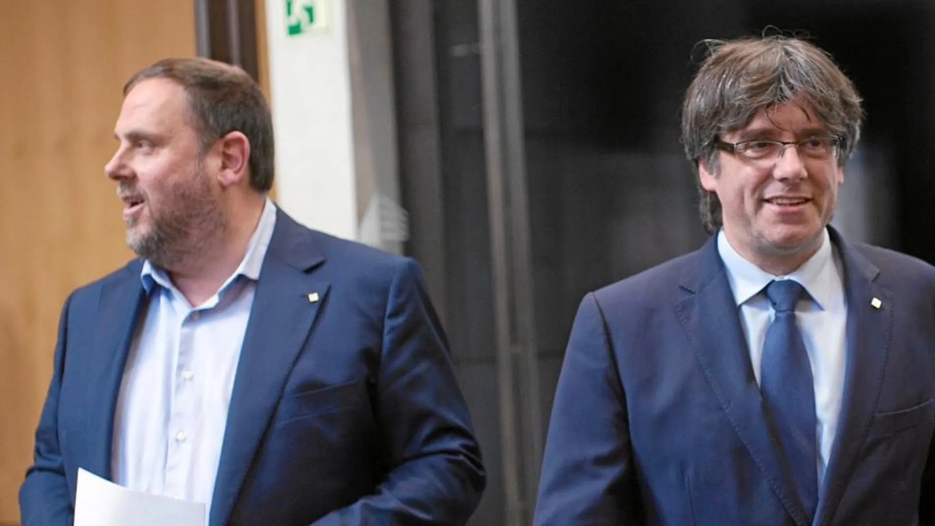 Oriol Junqueras y Carles Puigdemont, en un acto por el referéndum el pasado mes de mayo en Barcelona
