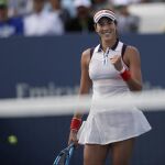 Muguruza celebra su triunfo ante Rybarikova