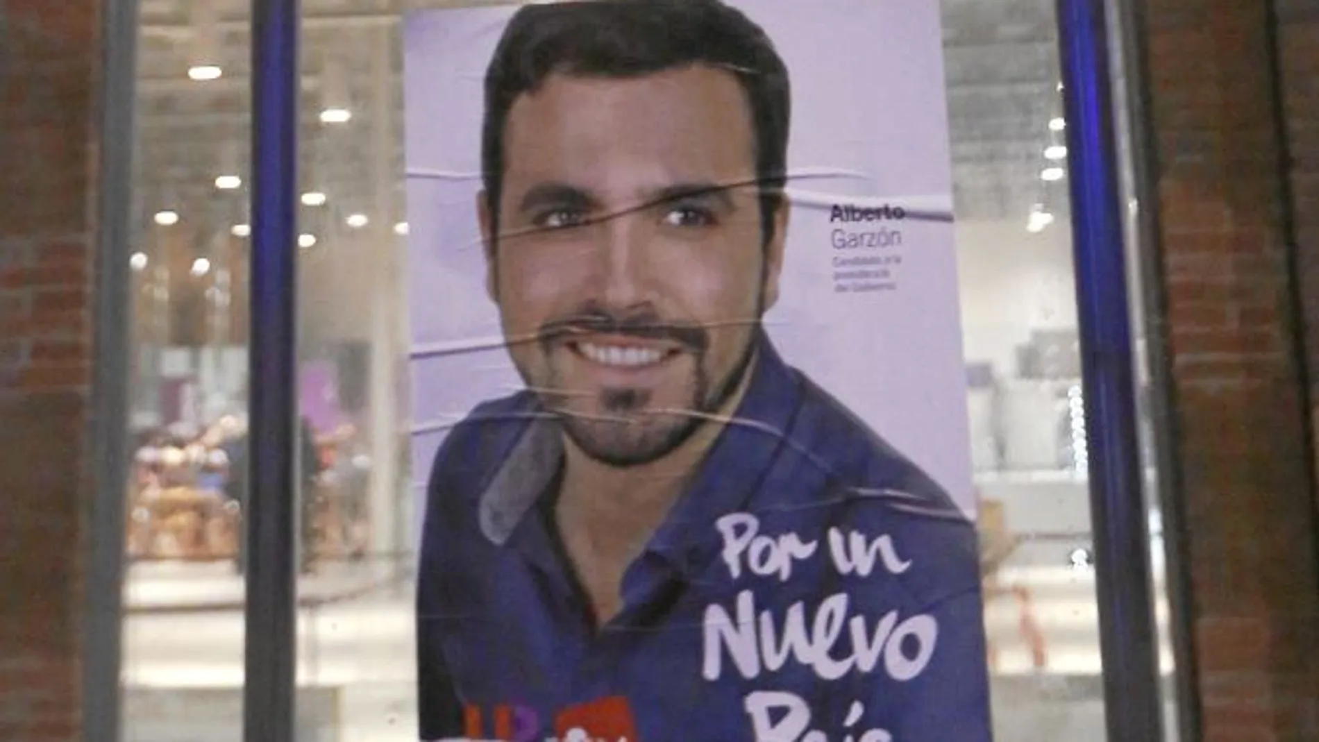 Cartel electoral del líder de IU, Alberto Garzón, en Madrid