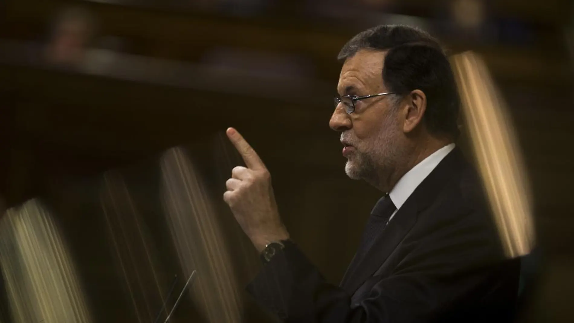 El candidato a la investidura, Mariano Rajoy, durante la segunda sesión en el Congreso