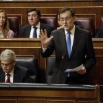 El presidente del Gobierno, Mariano Rajoy, durante la sesión de control al Gobierno que se celebra hoy en el pleno del Congreso de los Diputados