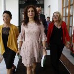 La consejera de Hacienda, junto a parte de su equipo, en el Parlamento de Andalucía