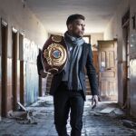 Ángel Moreno portando su cinturón de campeón latino