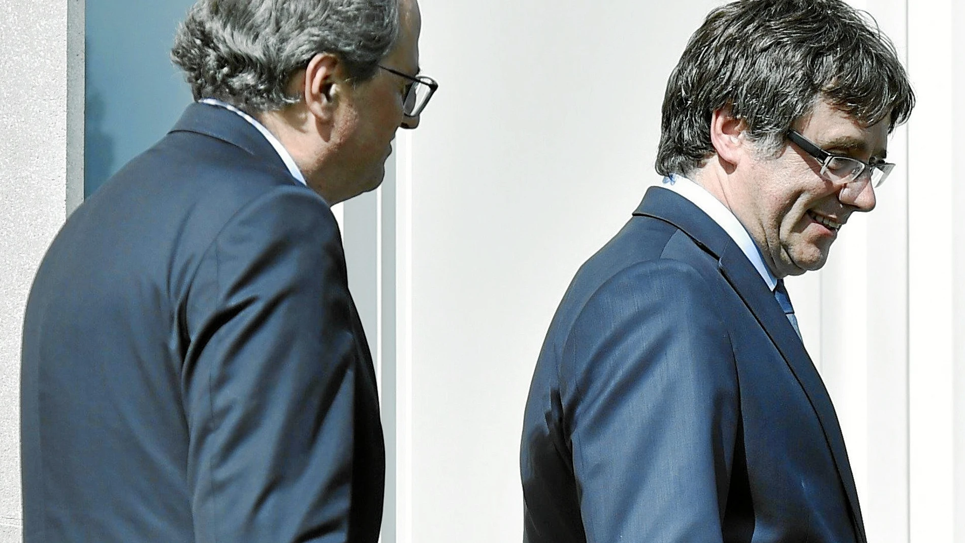 Quim Torra y Carles Puigdemont, en la localidad belga de Waterloo / Reuters