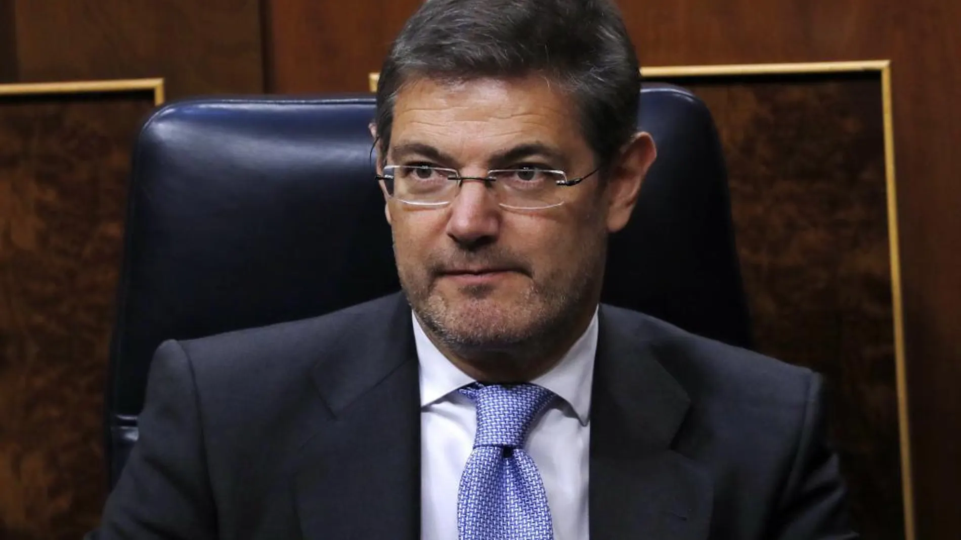 El ministro de Justicia, Rafael Catalá, tras las votaciones del pleno del Congreso