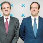 Jordi Gual, presidente de Caixabank, y Gonzalo Gortázar, consejero delegado