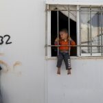 Refugiados sirios en un campamento de refugiados en Al Zaatari