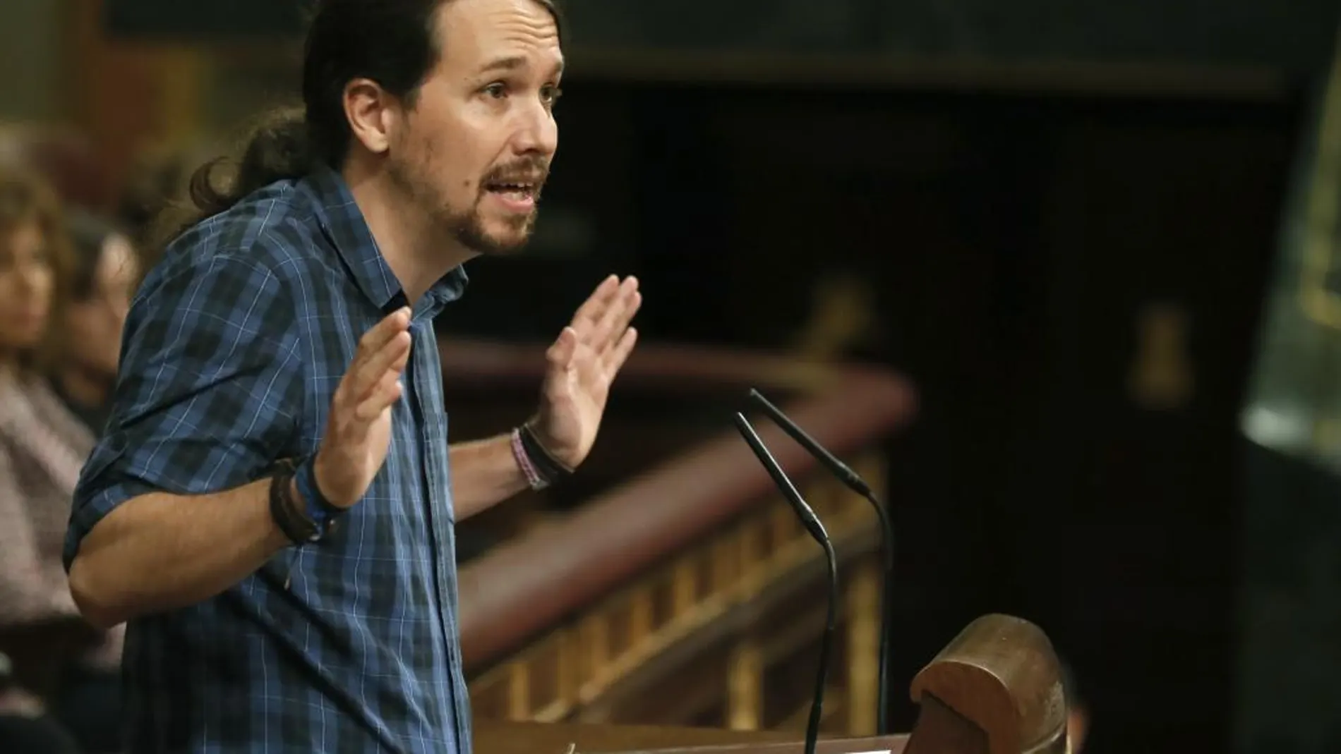 El líder de Podemos, Pablo Iglesias durante su intervención en el debate de investidura en el Congreso hoy en Madrid.