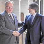 Puigdemont y Romeva desafían al TC y reciben al presidente de los liberales europeos