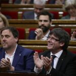 Carles Puigdemont y Oriol Junqueras