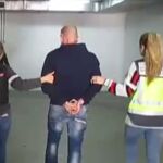 Uno de los acusados tras su detención/Atlas