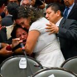 Carmen Medel al recibir la noticia del asesinato de su hija/Efe