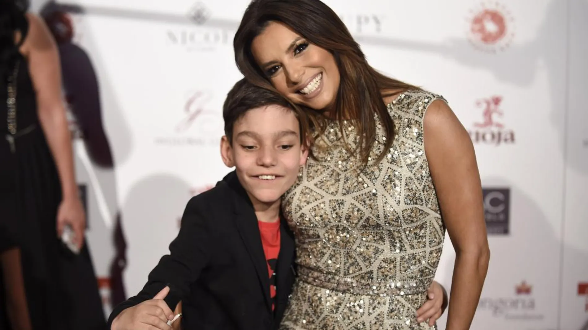 Adrián Martín con la actriz Eva Longoria