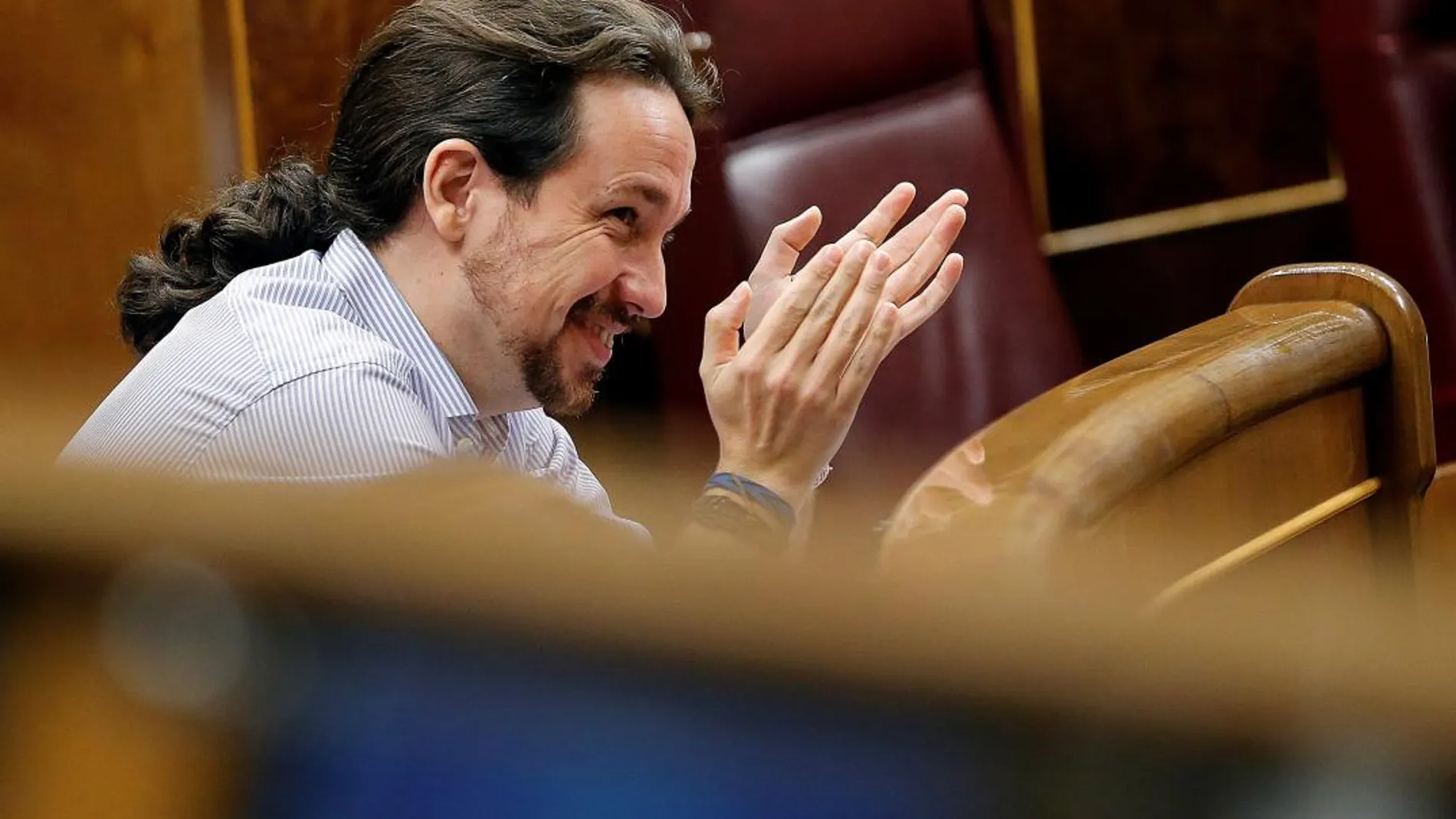 El líder de la formación Podemos, Pablo Iglesias, durante el pleno del Congreso de los Diputados