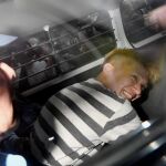 Satoshi Uematsu, durante su traslado desde la comisaría de la policía
