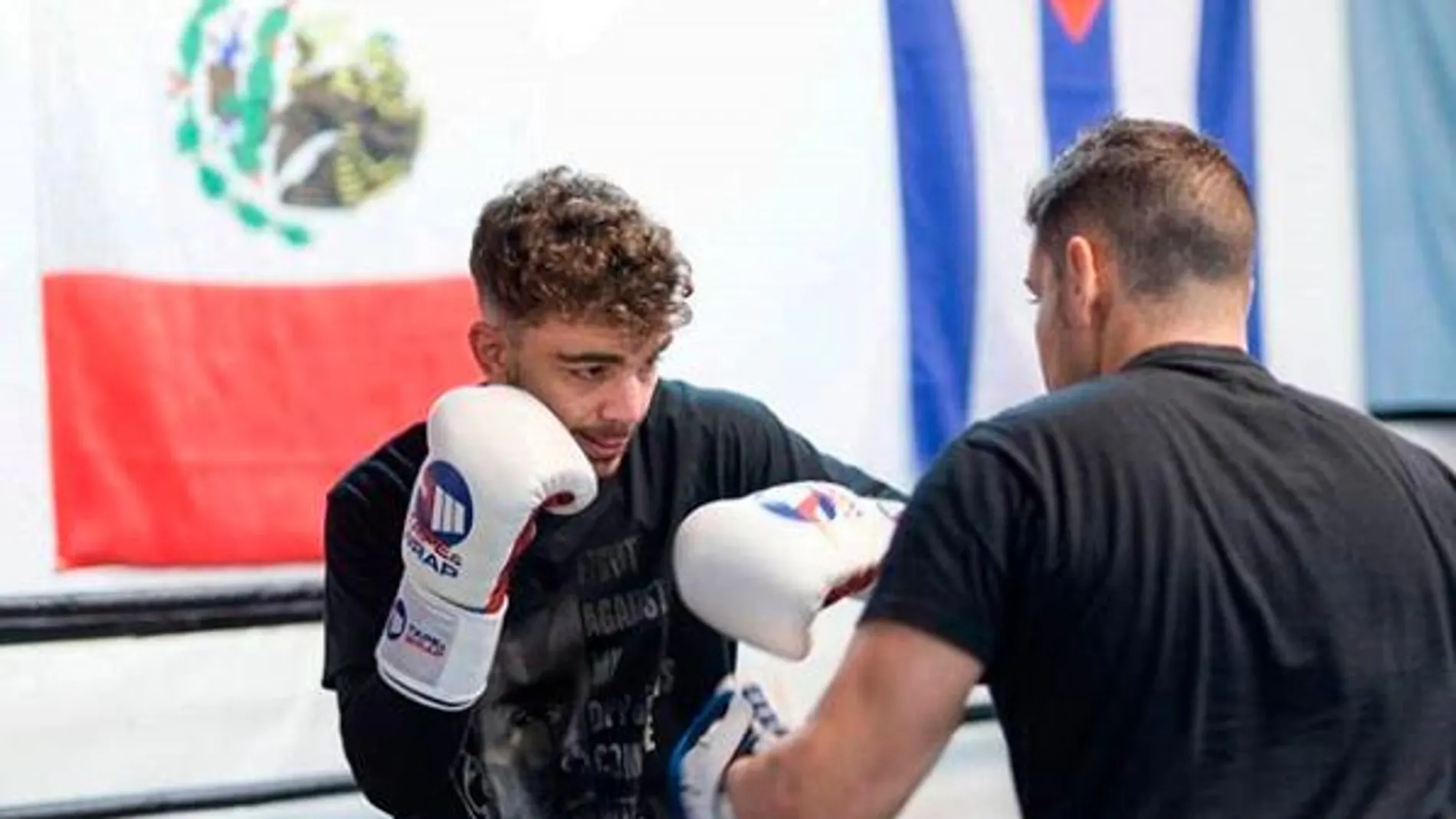 Imagen de Jon Fernández con su entrenador, Tinín Rodríguez