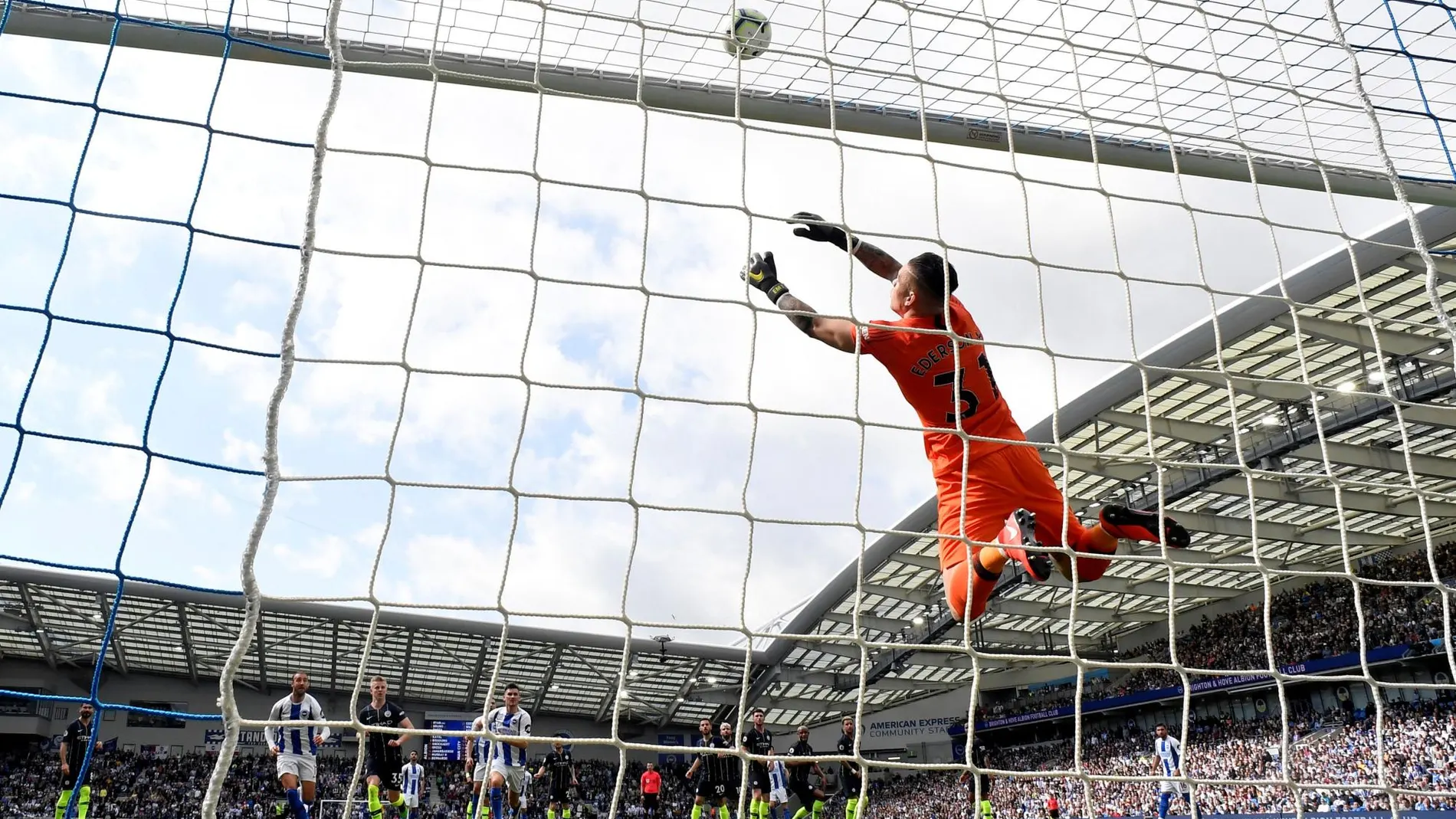 Express Community Stadium, Brighton, Britain - May 12, 2019 Manchester City's Ederson saves a shot from