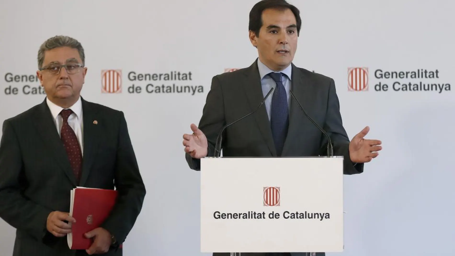 El secretario de Estado de Seguridad, José Antonio Nieto junto al delegado del Gobierno en Cataluña, Enric Millo