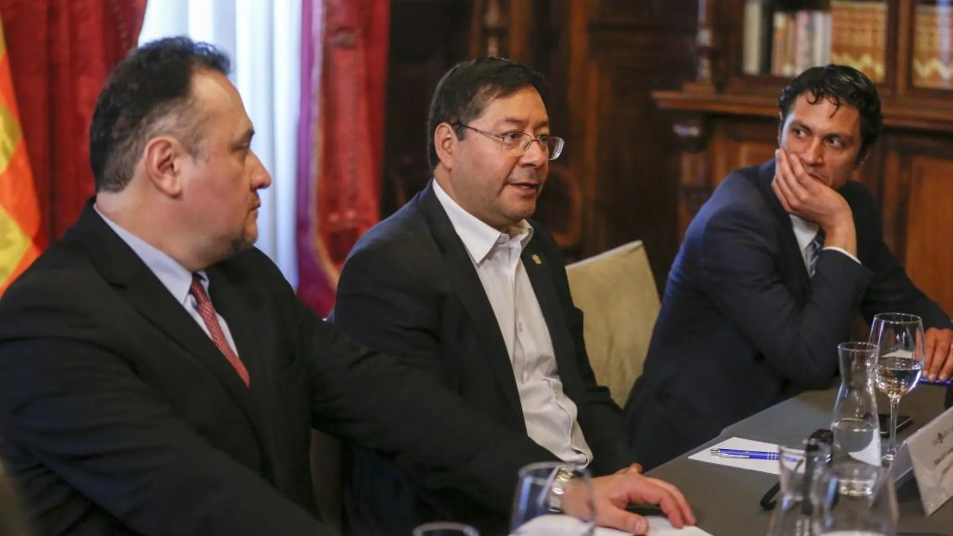 Los ministros René Orellana, Luis Arce y Marko Marcelo, en la Casa de América