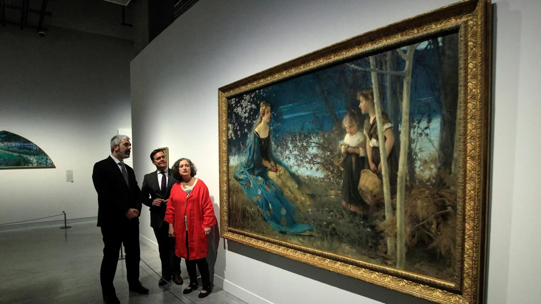 Ignasi Miró, Moisés Roiz y la comisaria Teresa Sala, ante «Cuento azul», de Josep María Tamburini / Foto: Manuel Olmedo