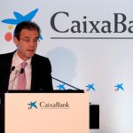 Jordi Gual en la presentación de los resultados de Caixabank/Reuters