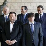 El presidente de la Generalitat, Carles Puigdemont, y su vicepresidente, Oriol Junqueras.