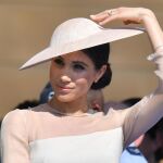 Enrique y Meghan participaron en un homenaje al príncipe de Gales en los jardines del Palacio de Buckingham / Foto: Reuters