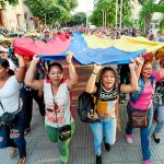Venezolanos residentes en Cúcuta (Colombia) marcharon ayer para pedir que se permita el paso de la ayuda humanitaria