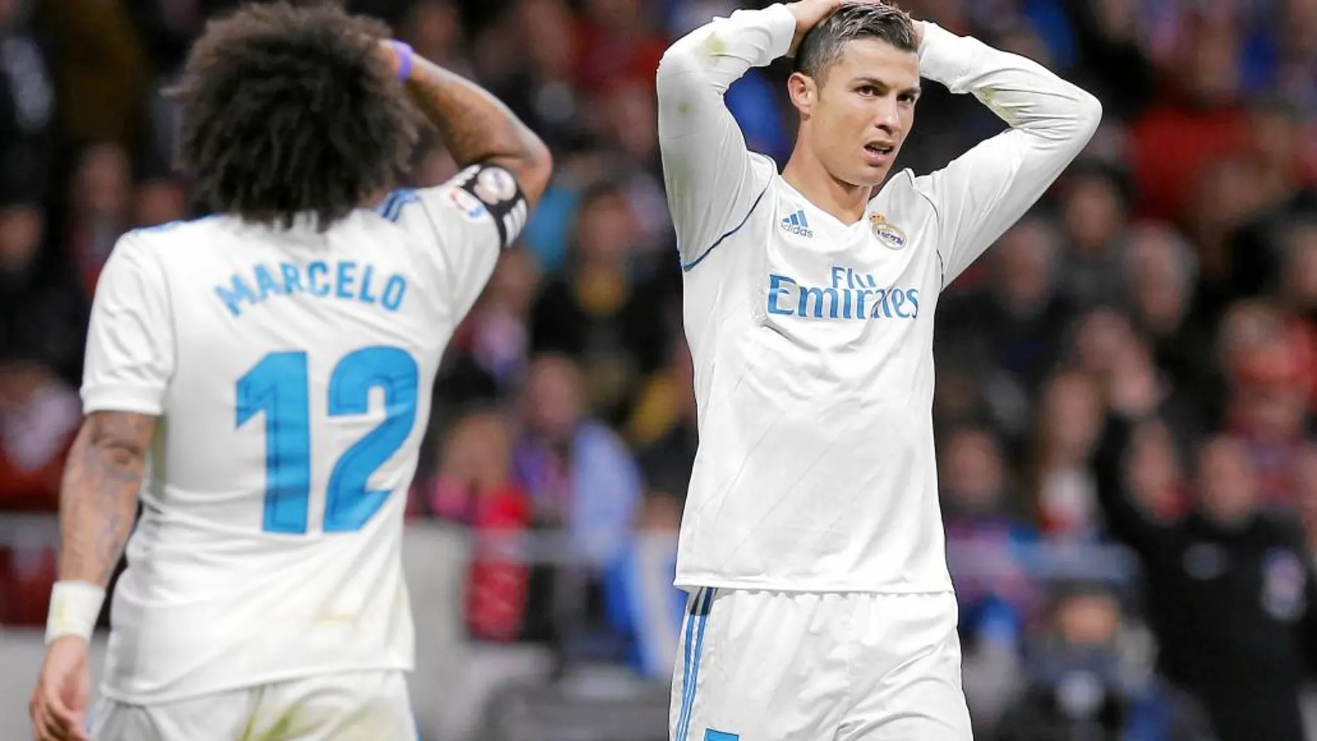 Marcelo y Cristiano, apesadumbrados al finalizar el derbi del sábado en el Wanda Metropolitano