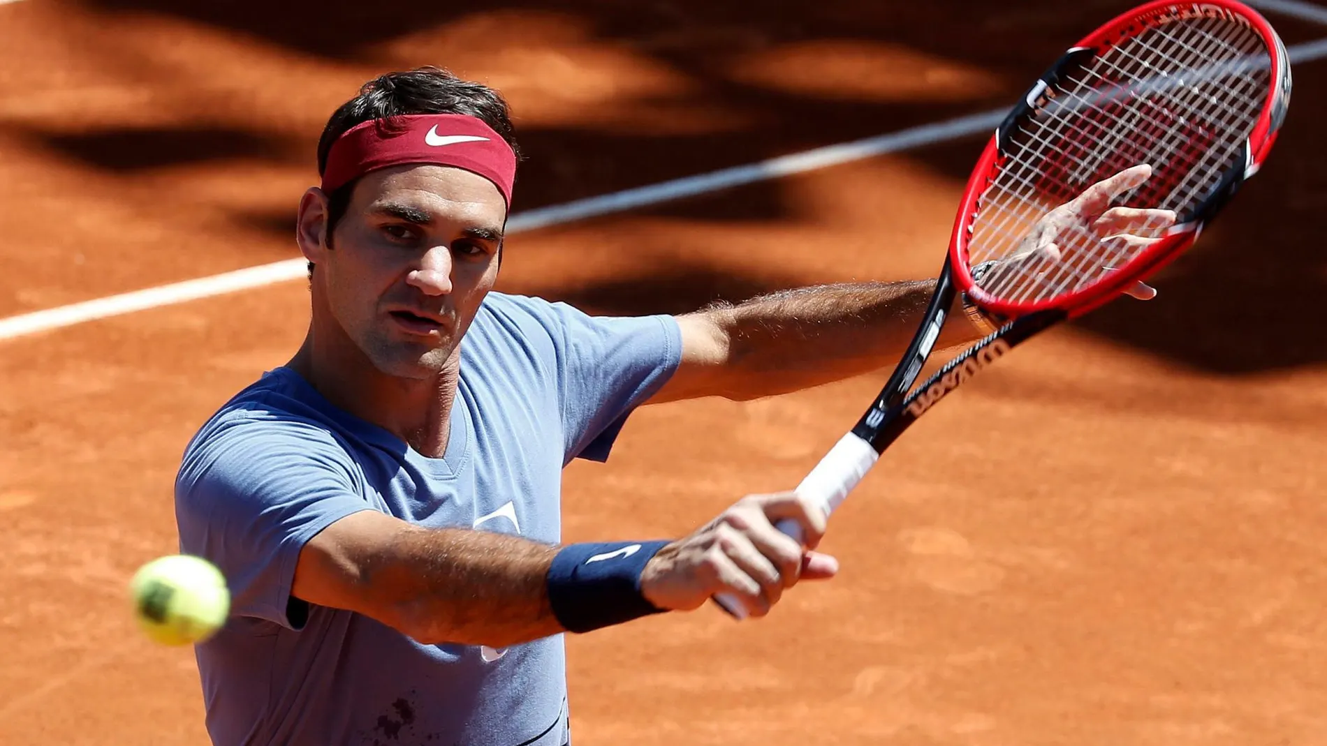 Federer, durante un entrenamiento en la Caja Mágica