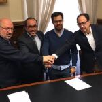 Amancio Martínez, Luis Rey, Eduardo Carazo y Manuel López, tras la firma del acuerdo