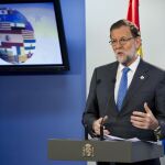 El presidente del Gobierno en funciones, Mariano Rajoy, durante la rueda de prensa que ha ofrecido hoy en Bruselas la reunión del Consejo Europeo