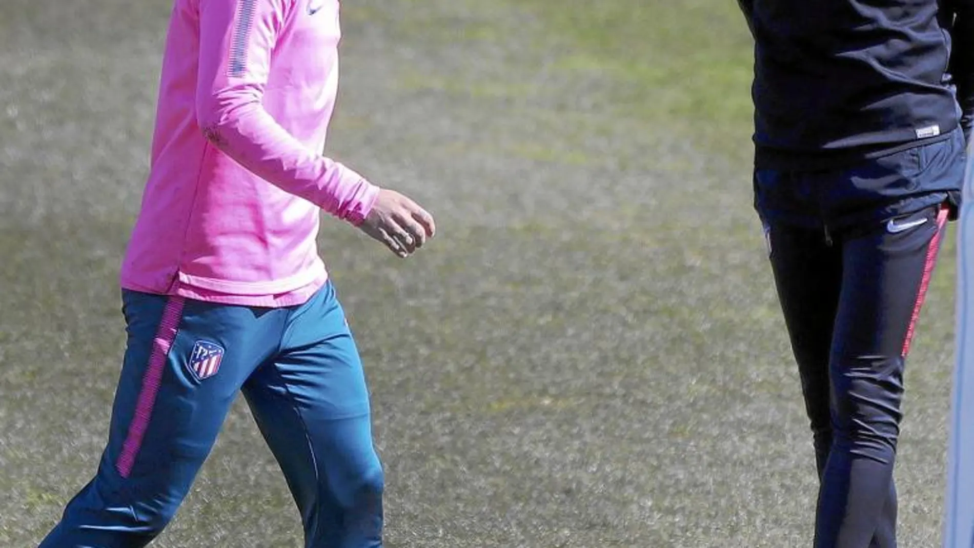 Griezmann y Simeone, durante el entrenamiento de ayer