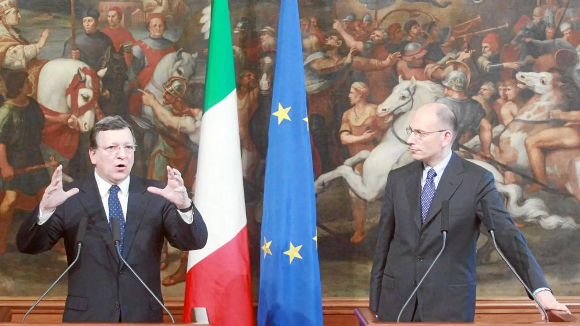 . Rome (Italy), 15/06/2013.- EU President Jose Manuel Durao Barroso (L), standing next to Italian Prime Minister Enrico Letta (R), gestures as he speaks during the press conference at Chigi Palace in Rome, Italy, 15 June 2013. EFE/EPA/FABIO CAMPANA