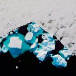 Un trozo de hielo de Groenlandia desgajándose, el pasado mes de julio / Reuters