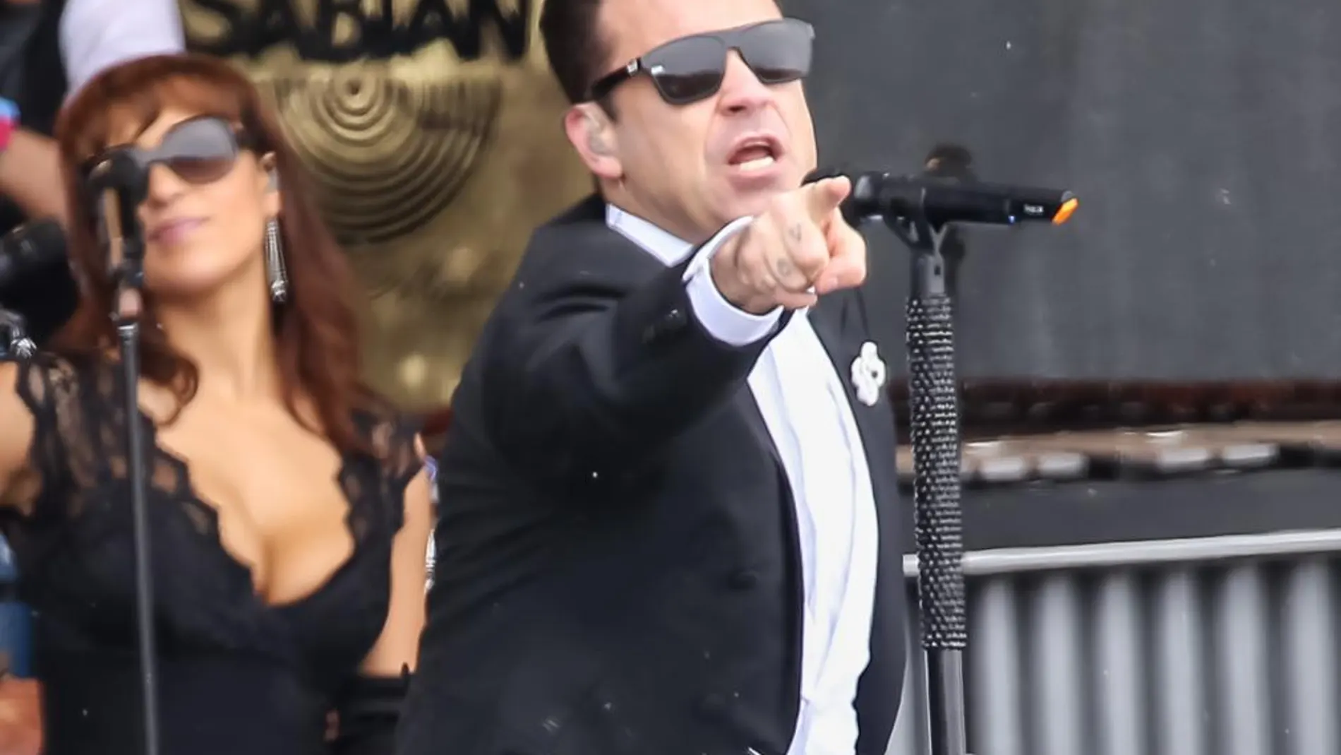 El cantante británico Robbie Williams, durante una actuación