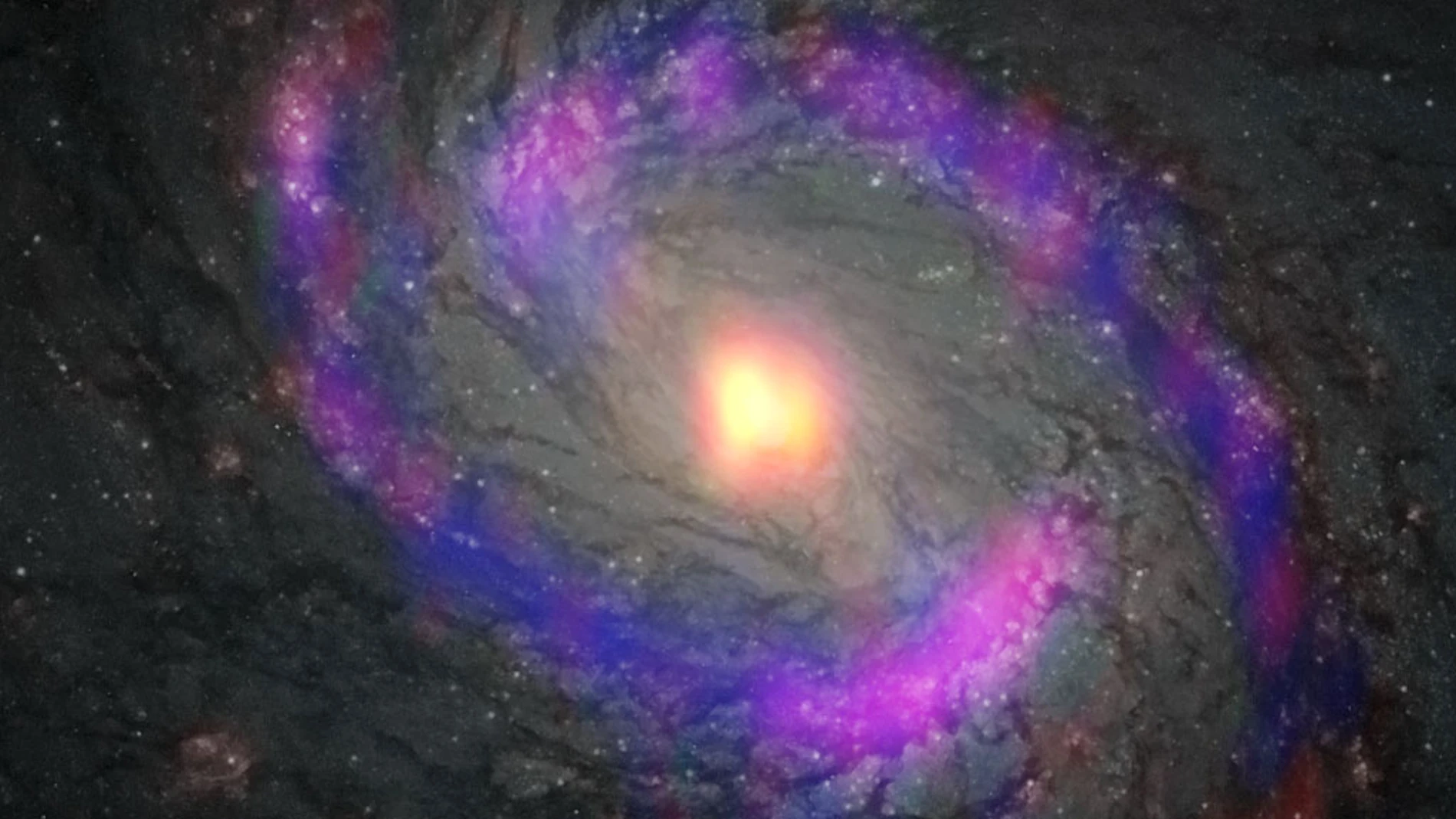 Zona central de la galaxia M77, también conocida como NGC 1068, observada por ALMA y el telescopio espacial Hubble de NASA/ESA.