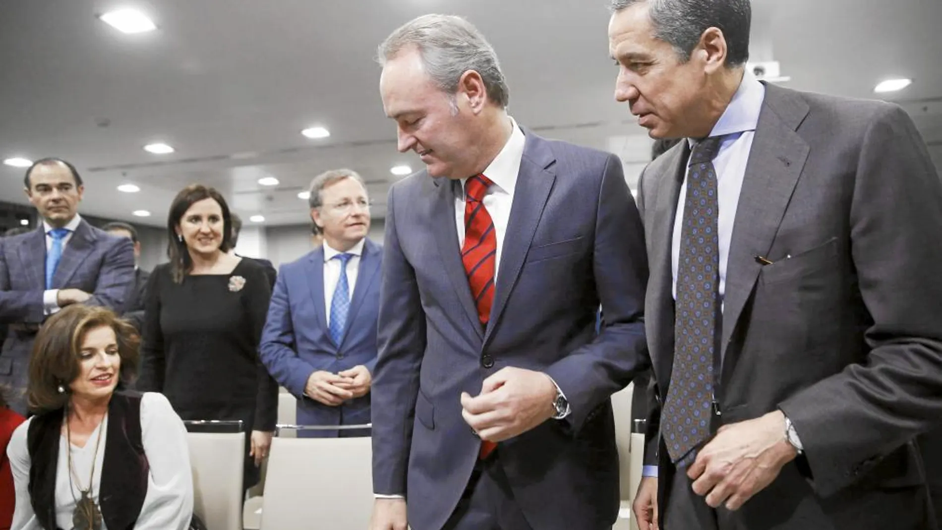 El presidente Alberto Fabra, junto al expresidente de la Generalitat, Eduardo Zaplana y la alcaldesa de Madrid, Ana Botella.