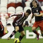 Emre Belozoglu y Filipe Luis Kasmirski