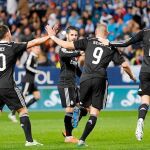 Los jugadores del Real Madrid celebran uno de los goles en La Rosaleda