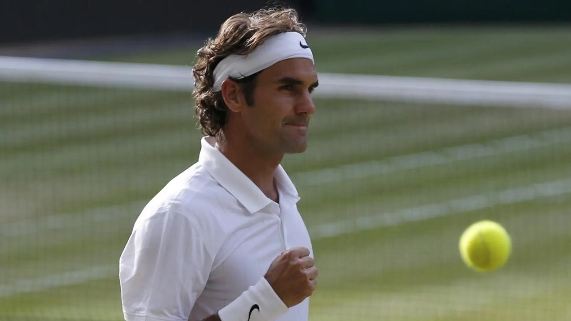 Roger Federer durante el partido contra Milos Raonic