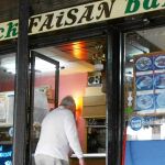 El dueño del Bar Faisán, Joseba Elosua, entra en su establecimiento el pasado julio de 2011